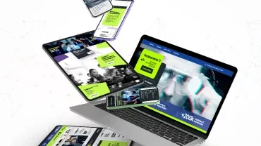 Dispositivos eletrônicos exibindo sites com design moderno e cores vibrantes.