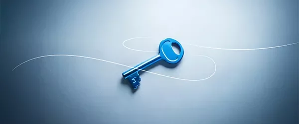 Chave azul sobre superfície iluminada com linhas curvas brancas, simbolizando propriedade, construção